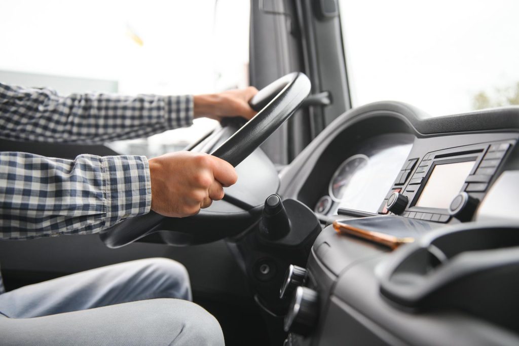 truck-drivers-big-truck-of-driver-s-hands-on-big
